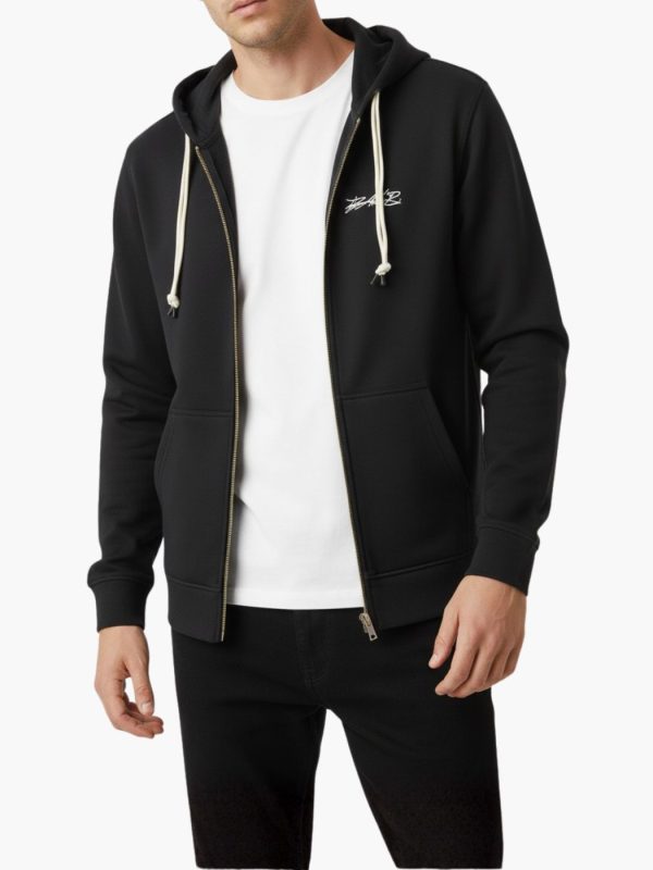 קפוצ’ון באלר בצבע שחור עם רוכסן מלא, שרוך בהיר וכיסים קדמיים